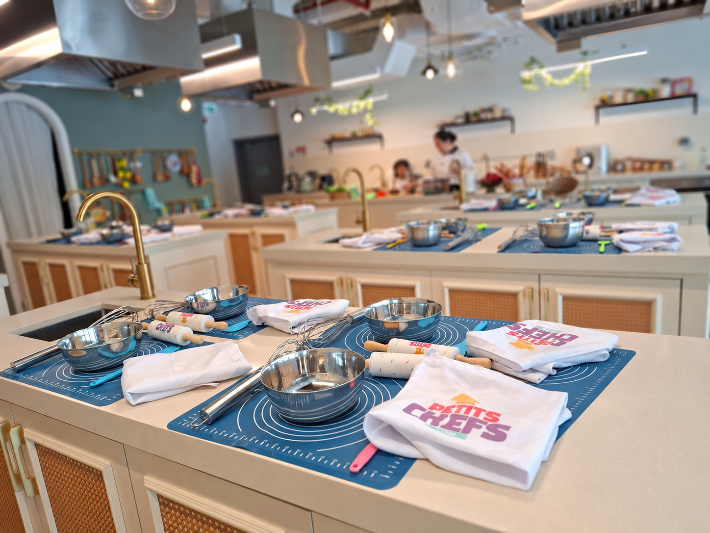 Petits Chefs kitchen studio — workstations set and ready for class